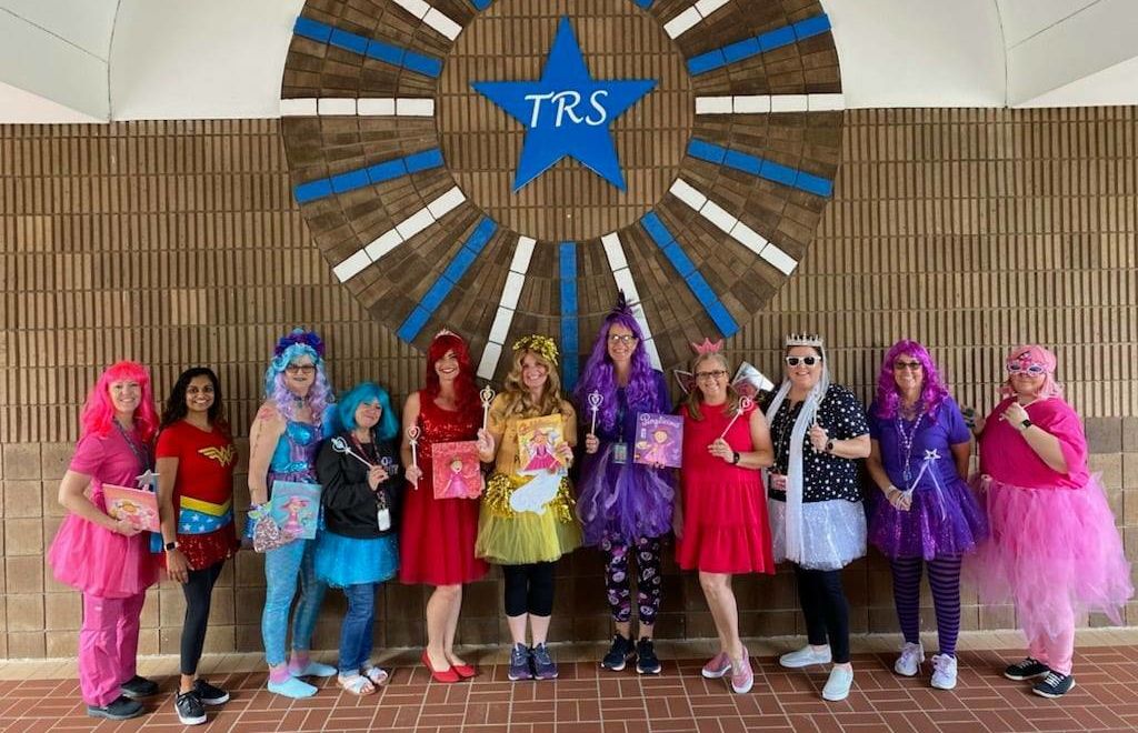 teachers in costumes for a kindergarten parade