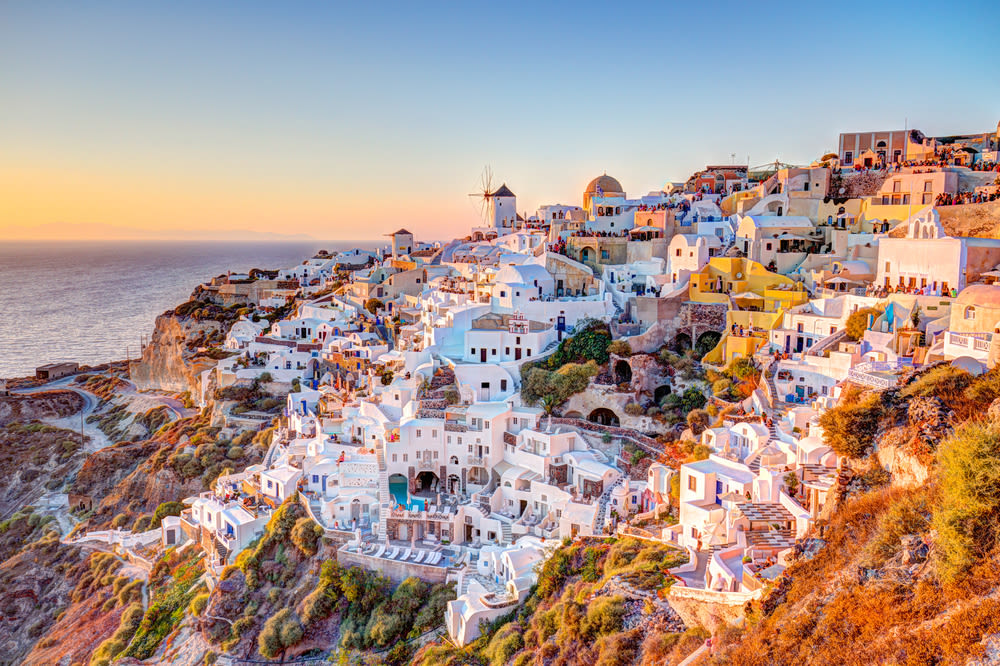 Traditional white buildings facing Mediterranean Sea in Oia