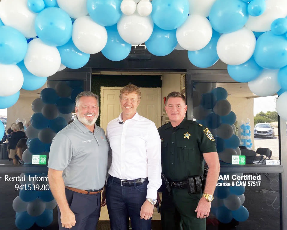 Manatee County Commissioner Mike Rahn, Mark Vengroff, CEO of One Stop Housing, and Captain Rick Gerken of the Manatee County Sheriff's Office at University Row Apartments at 8440 N. Tamiami Trail.