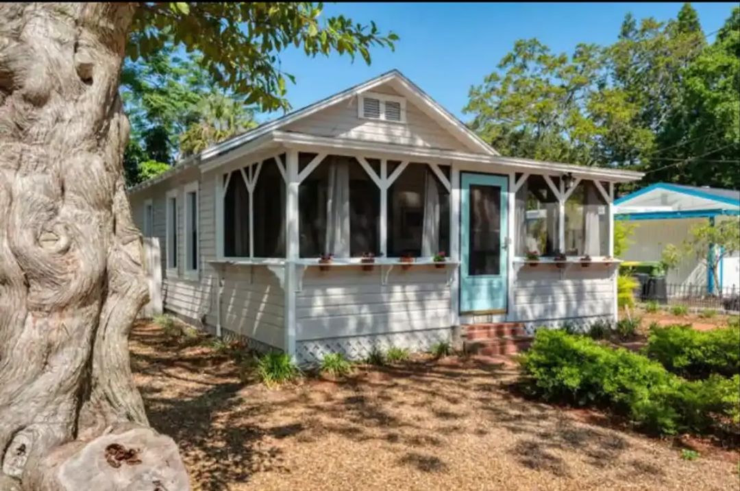 The screened porch is one of the main features of this adorable cottage.