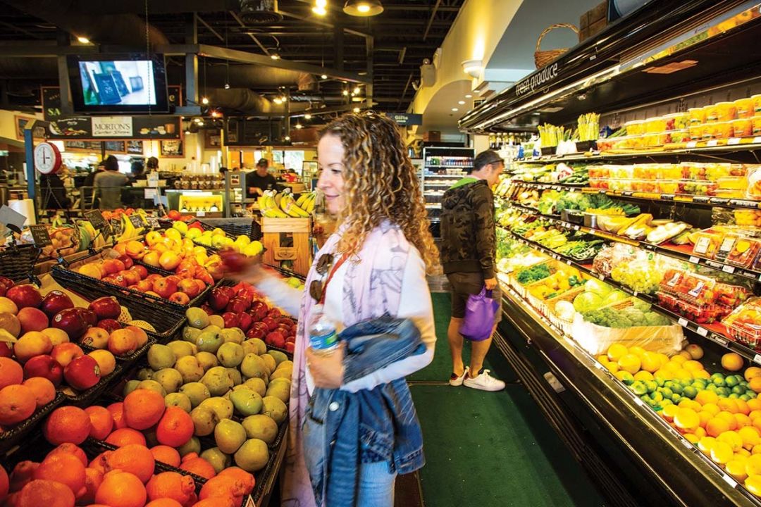 A shopper at Morton's Gourmet Market in Southside Village, pre-pandemic.