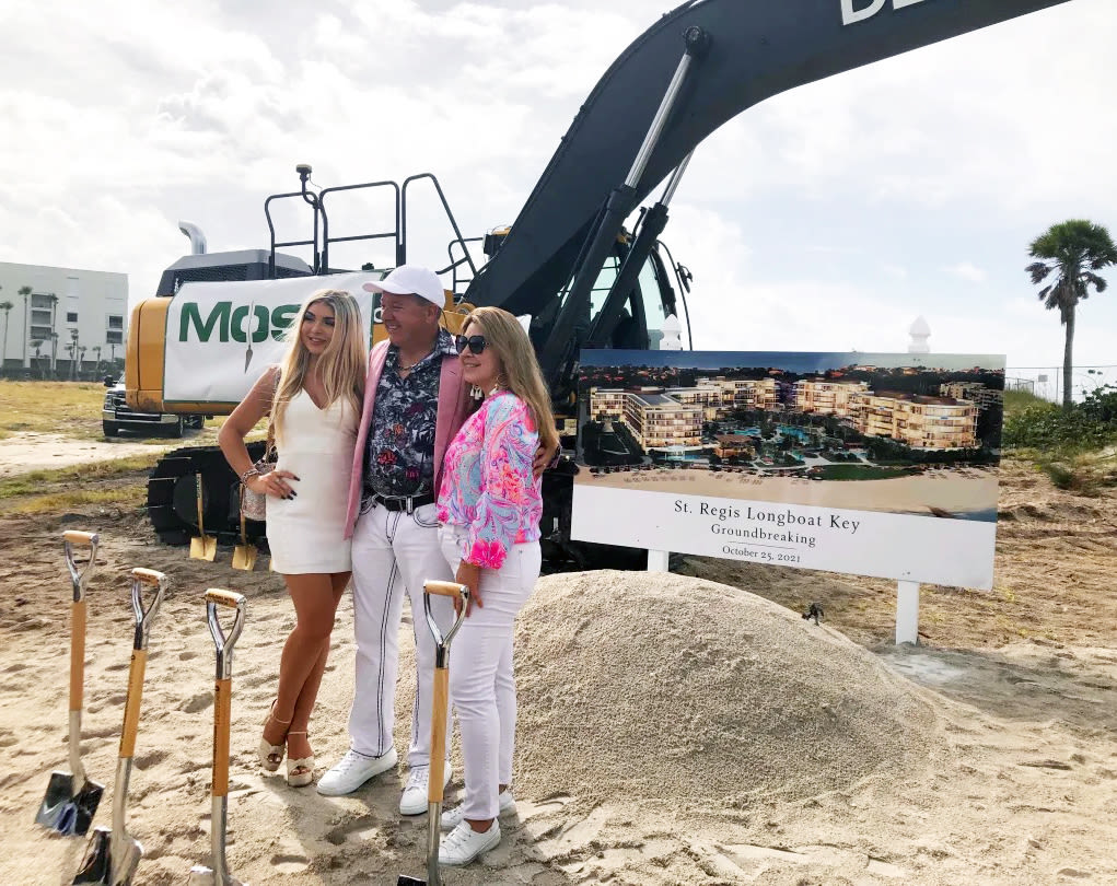 Rainy morning weather didn’t get in the way of the groundbreaking ceremony for the St. Regis Residences and Hotel on Longboat Key. Developer Charles Whittal poses with his wife and daughter on the site.