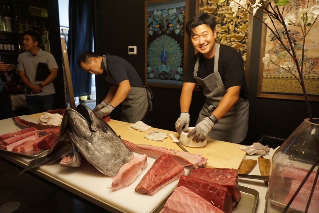 JPan chefs breaking down a large bluefin tuna.