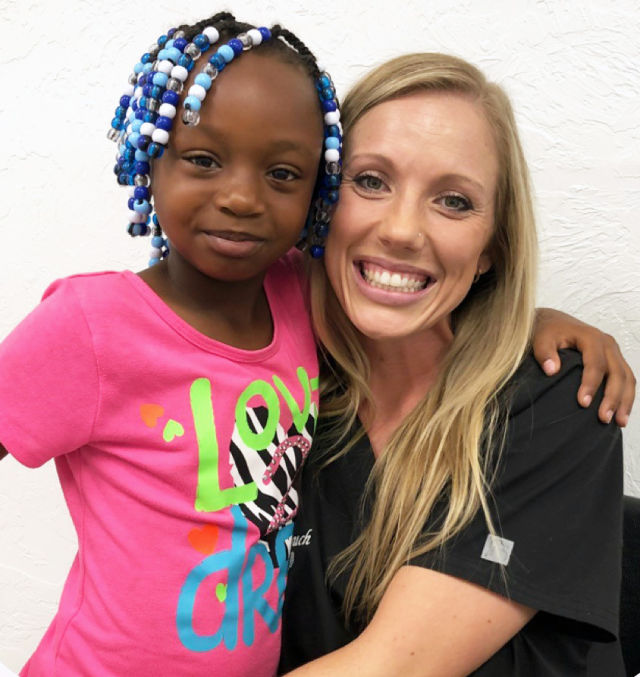 Ashley Tinker with her "little," Ja'Kenyalee