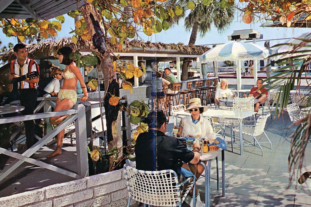 A vintage view of the Colony's tiki bar and pool areas.