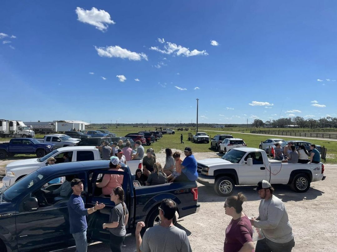 Volunteers gather at Dakin Dairy to help the farm's recovery efforts.