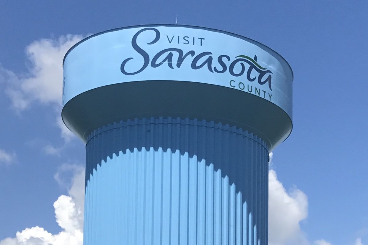 Visit Sarasota County Logo Painted on Water Tower Sarasota Magazine