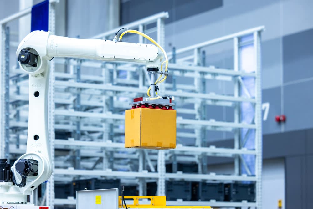 Engineer programming a PLC