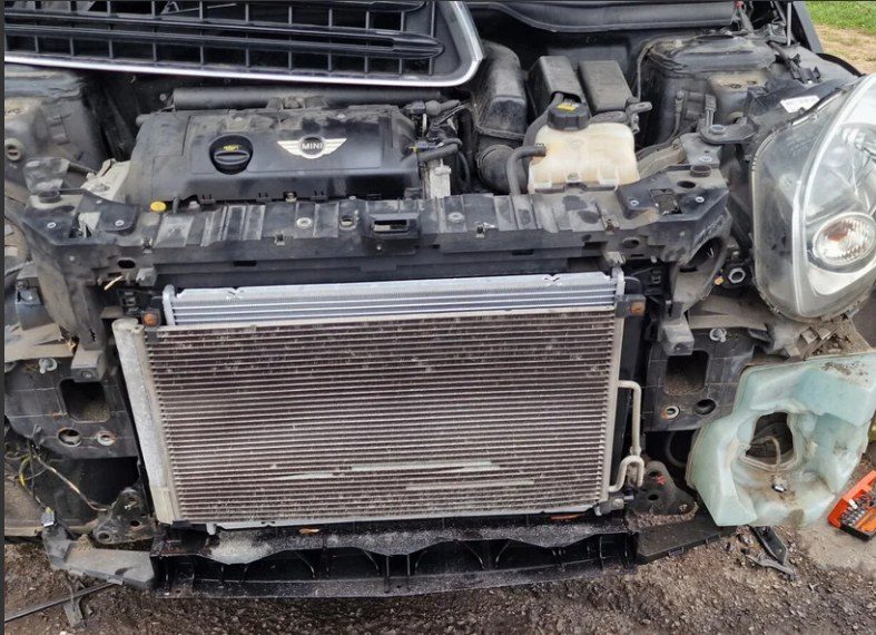 Radiator and front-end work on a Mini