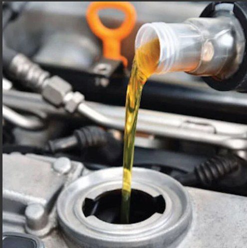 Oil being poured during a service