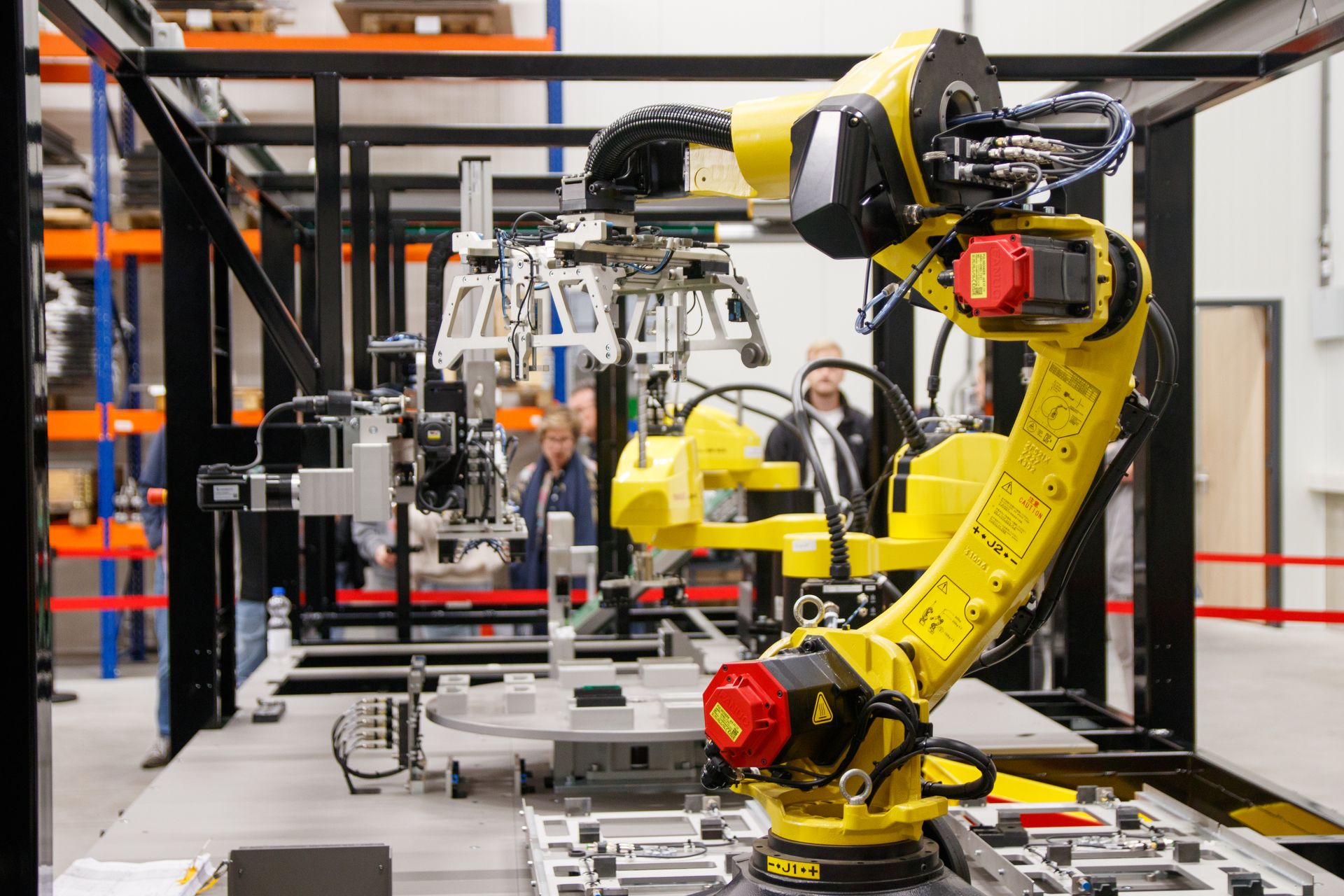Engineers commissioning a robot cell