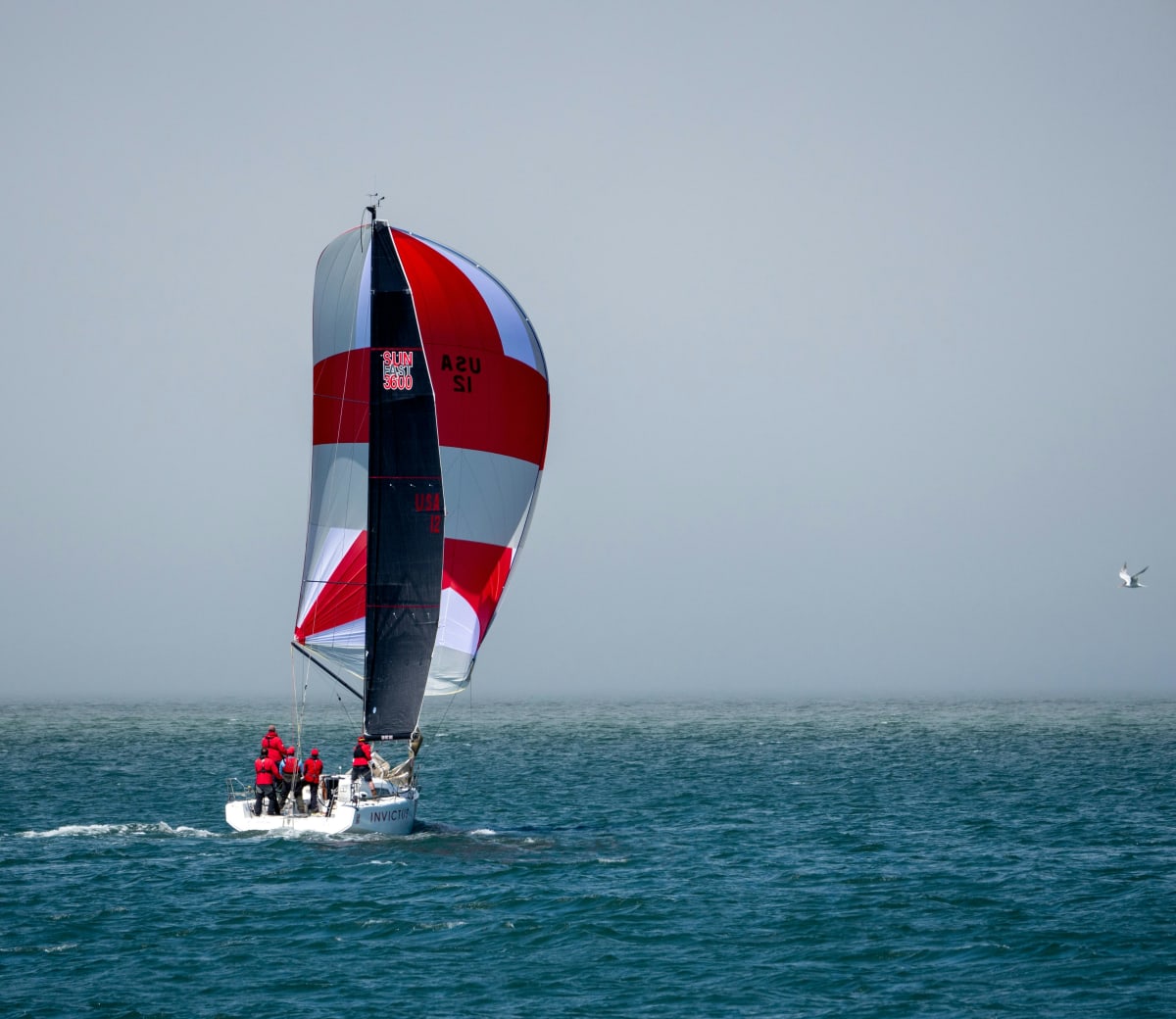 sailboat tacking through the wind from one tack to another