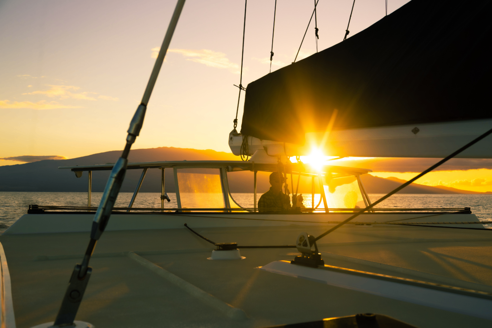 sailing at sunset, captain