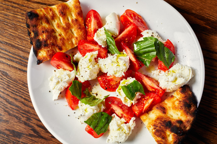 Sally's Caprese Salad, on a white plate