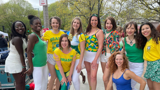 group of samba performers posed for a picture