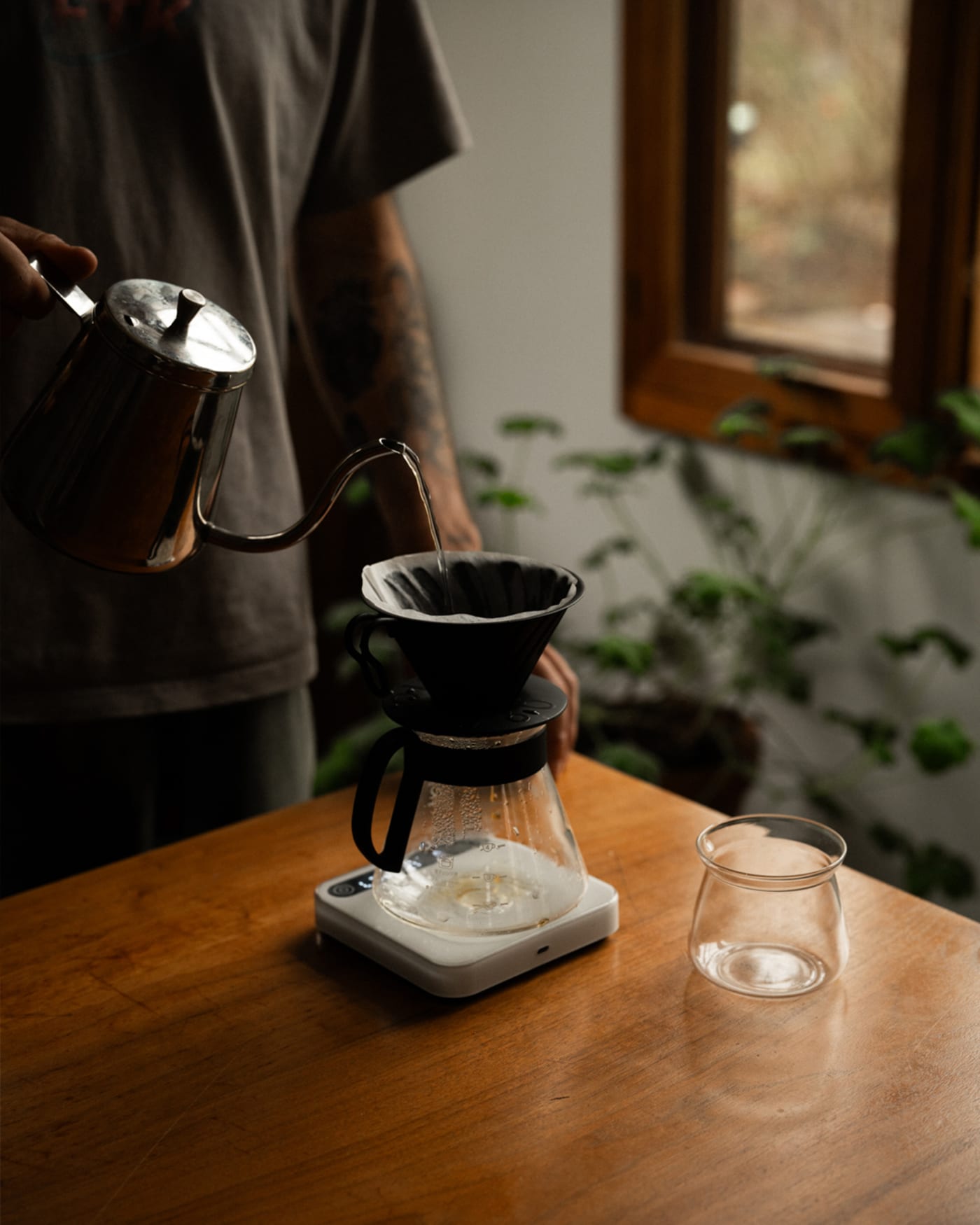 Pour over brewing at a kitchenette.
