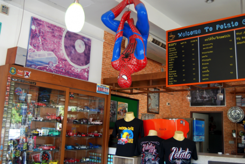 Spiderman just hanging around to take your order.