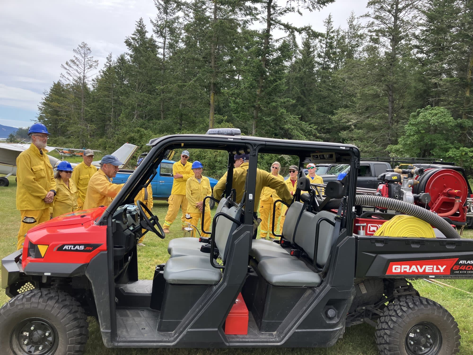 Brigade members learning to operate fire vehicles