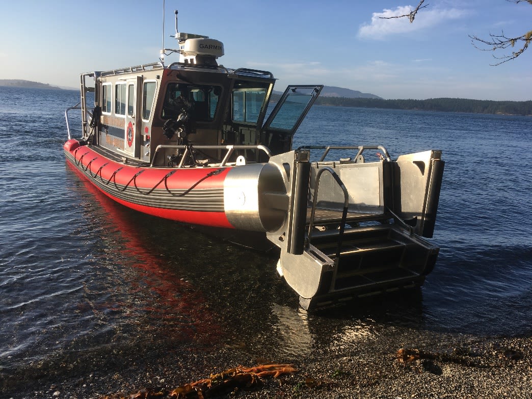 Fireboat 31 with hydraulic bow door lowered for beach landing