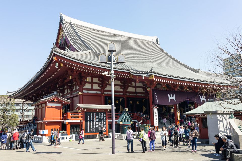 A temple surrounded by people