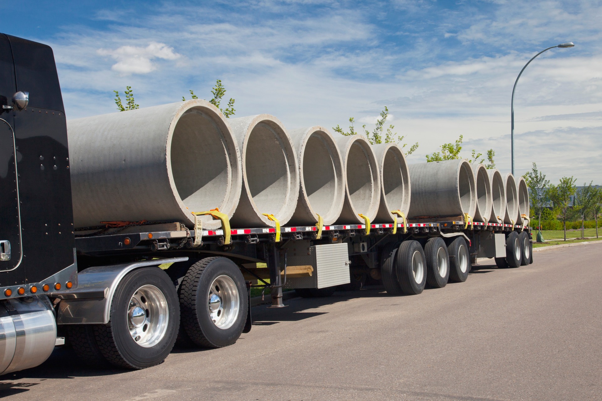 Semi-Trailer Truck Carrying Sewer Pipes; Edmonton, Alberta, Canada