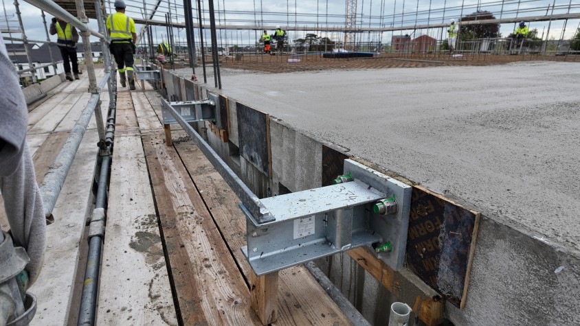 Anchor protruding from slab edge