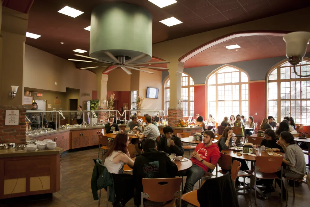 Bates Dining Hall with students sitting at tables eating.