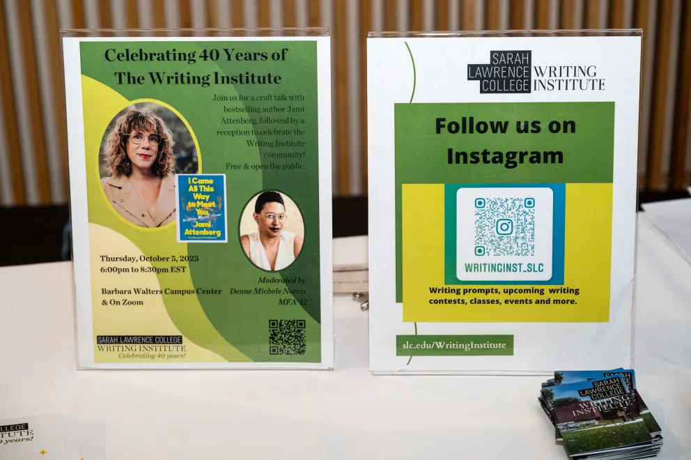 a couple of pamphlets sitting on top of a table next to each other on top of a white table