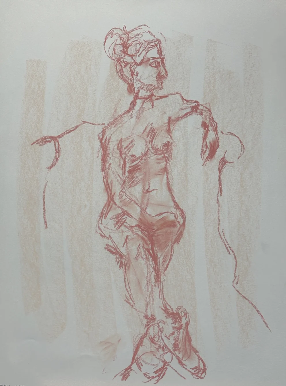 Figure sketch with a seated pose, drawn in red pastel on a white background with light shading.