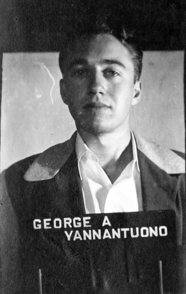 Vintage black and white photo of a person with a name tag.