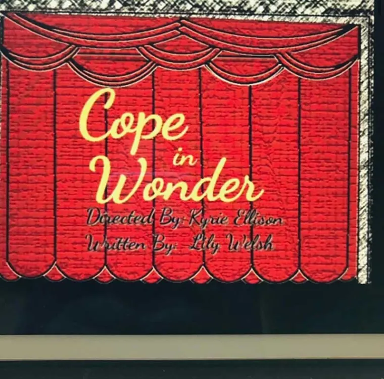 Red stage curtain with the text "Cope in Wonder," directed by Kyrie Ellison and written by Lily Welsh.