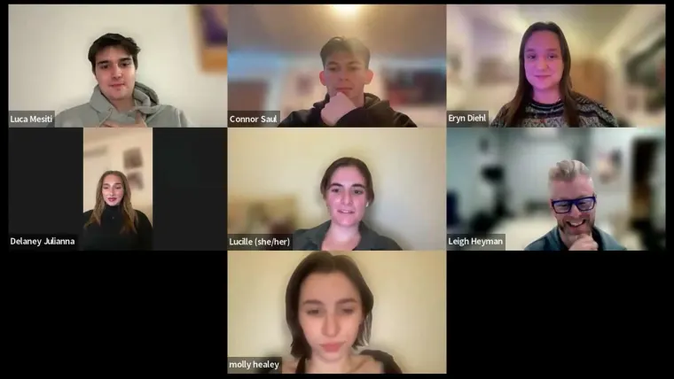 Seven people in a video call arranged in a grid. Each has a name label, and most are smiling or have a neutral expression.