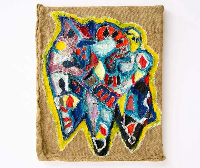 Abstract painting with vibrant colors and varied shapes on a burlap canvas. Predominant colors are blue, red, and yellow.