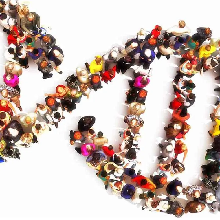 Aerial view of diverse people standing in formation resembling a DNA double helix structure against a white background.