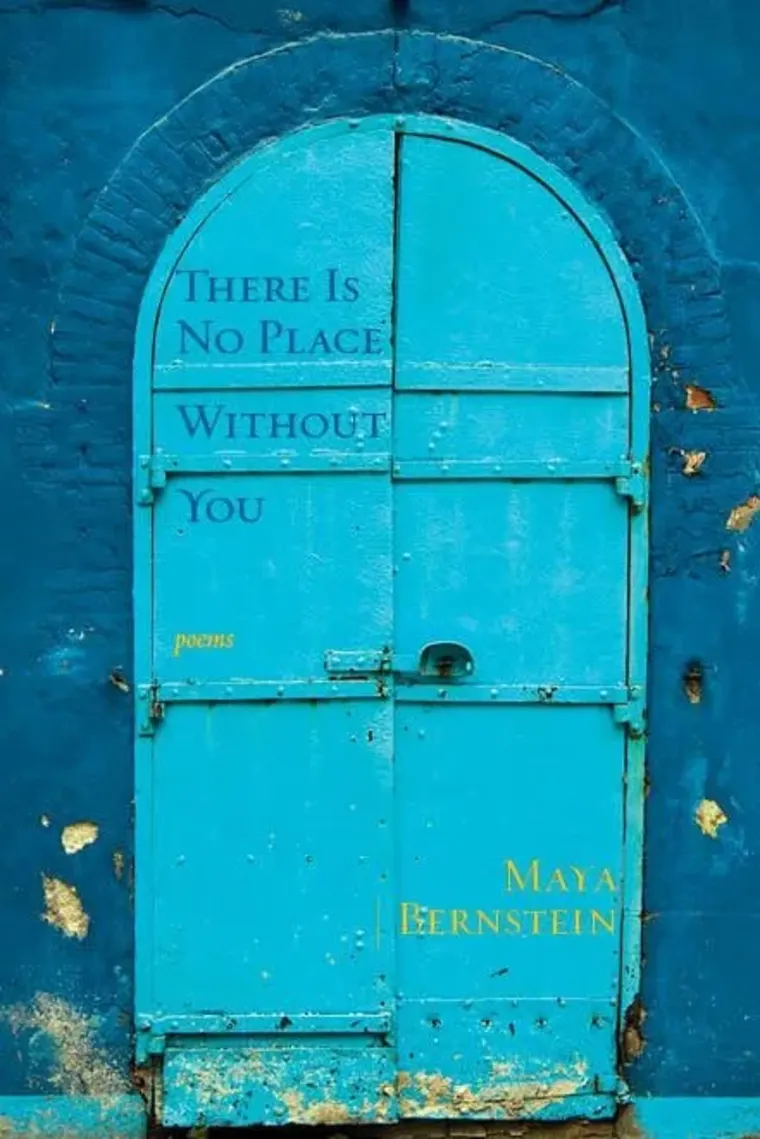 Blue arched door with text: "There is no place without you. Poems by Maya Bernstein." Weathered wall background.