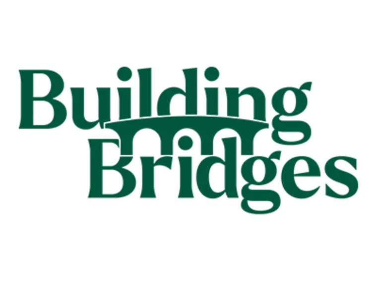 The image displays the words "Building Bridges" with a stylized bridge design incorporated within the letters.