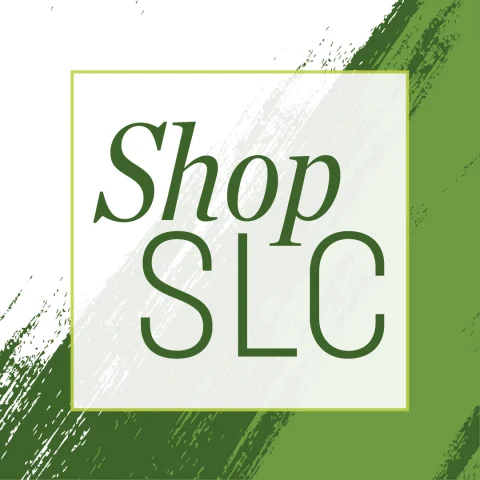 "Shop SLC" text in green on a white and green brushstroke background.
