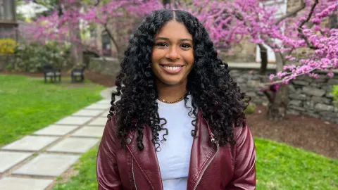 Portrait smiling person standing outdoors