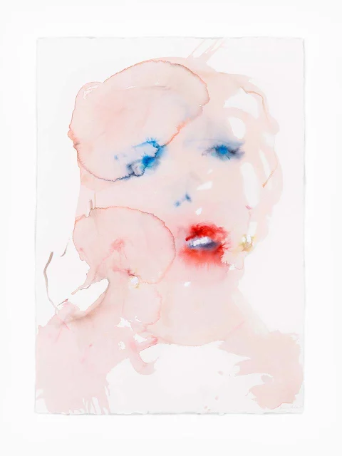 Abstract watercolor of a face with soft pinks, blues, and reds blending into each other, creating a dreamy, ethereal effect.