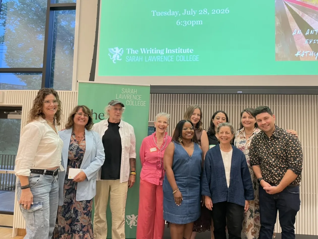 A group of people standing in front of a Sarah Lawrence College sign and a screen displaying event details for July 28, 2026, at 6:30pm.