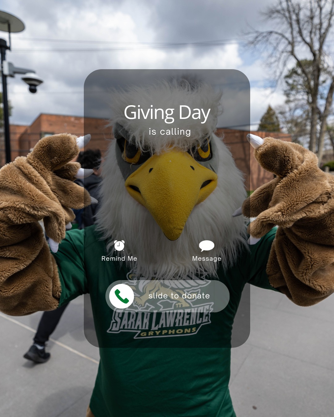 A person in a griffin costume, wearing a green Sarah Lawrence shirt, poses with text overlay saying "Giving Day is calling, slide to donate."