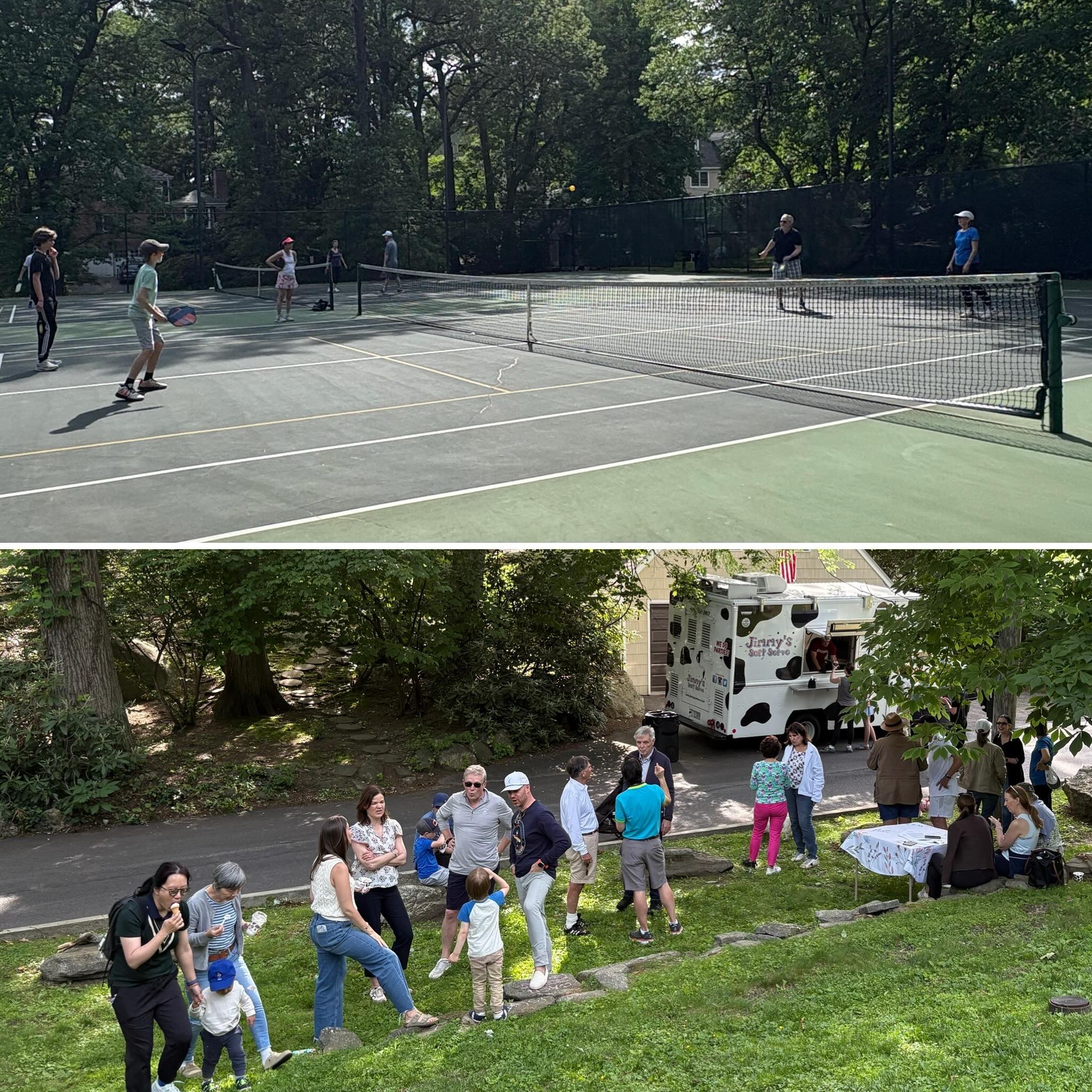 People playing tennis on a court surrounded by trees. Below, a group gathers near an ice cream truck in a grassy area.