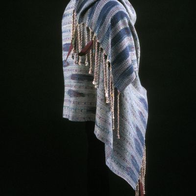 Shawl with feathers bound into the fringes and feather imagery painted on the border in the cloth, 1993