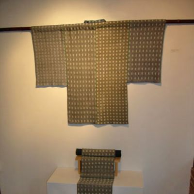 Under the Moon installation view kimono and roll of cloth