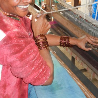 A weaver at Womenwork