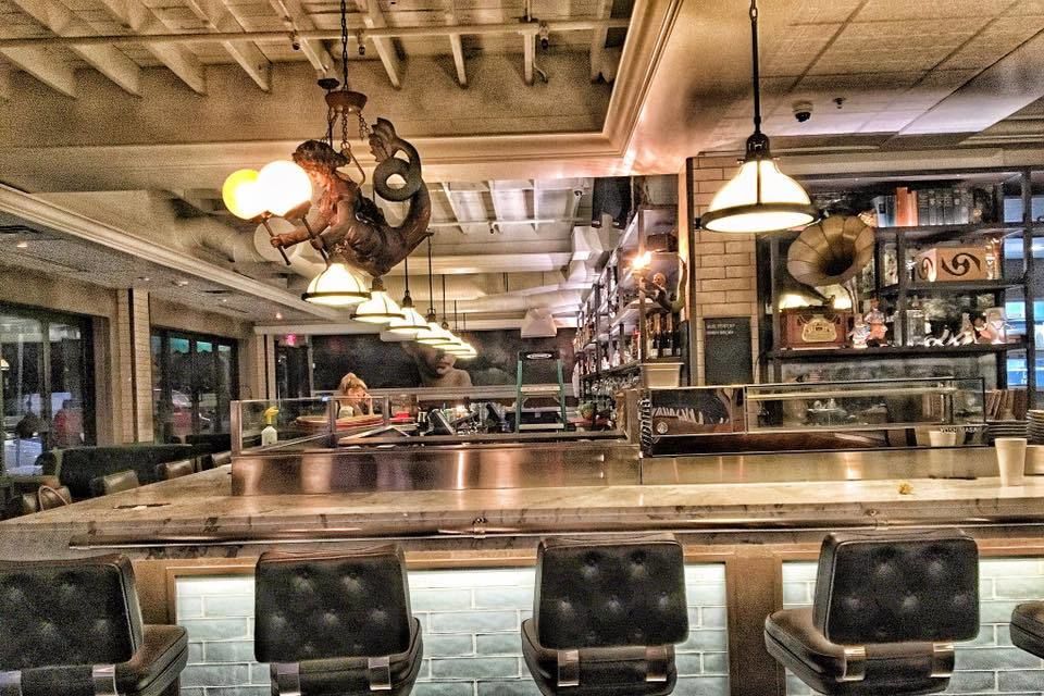 Veronica Fish and Oyster Bar dining room and oyster bar in Sarasota.