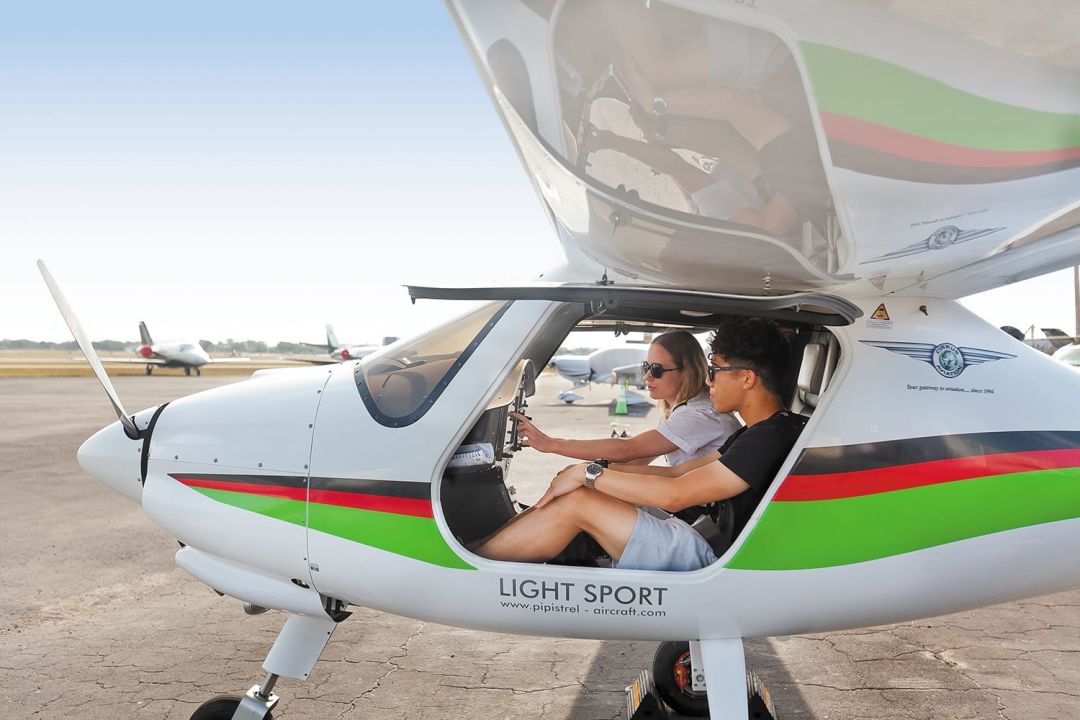 Student pilot Colin Poots with flight instructor Jayna Chufar.