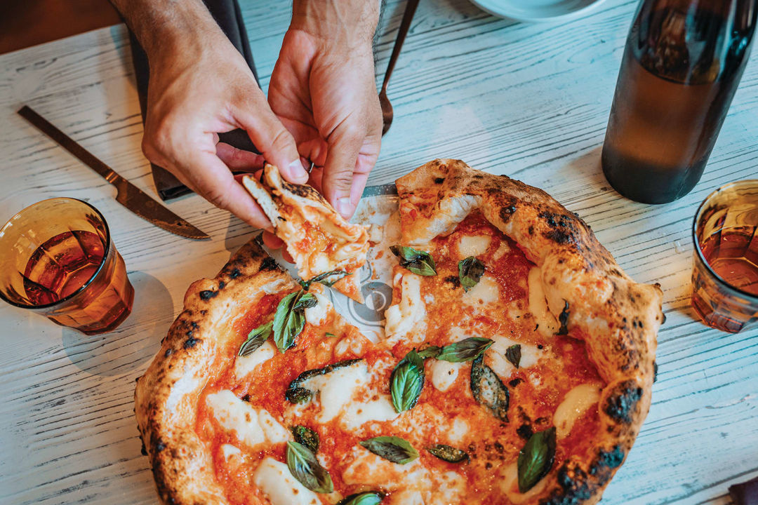 The restaurant offers Neapolitan-style pizzas, like this classic Margherita.