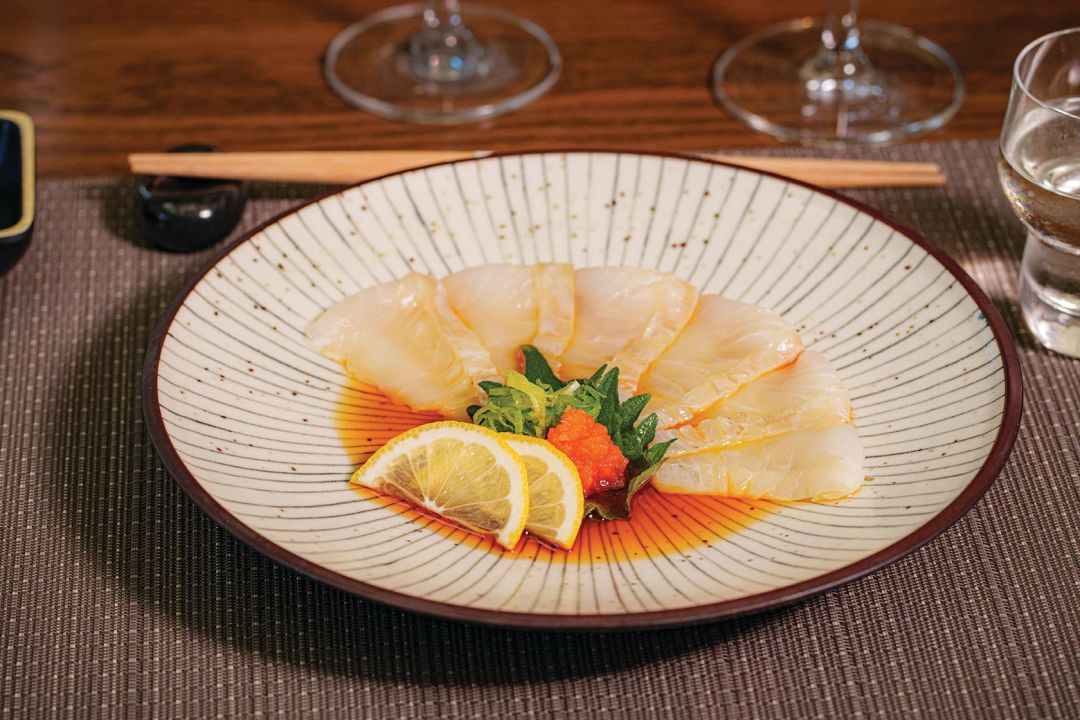 A selection of raw crudo dishes includes the “Hirame Usuzukuri,” with kombu, flounder and pickled radish.
