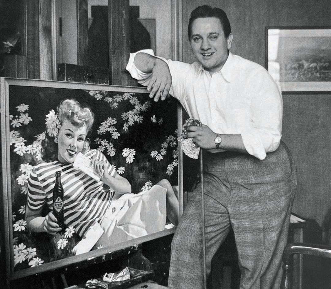 The artist poses with a finished painting.